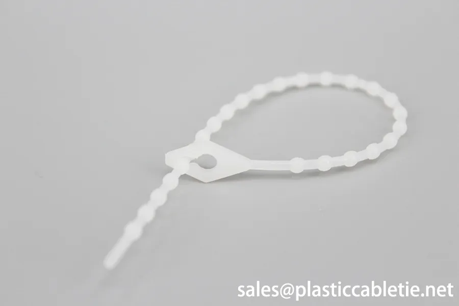 100mm UL 94V-2 Xinguang adjustable knot ball bead plastic nylon cable ties zip ties