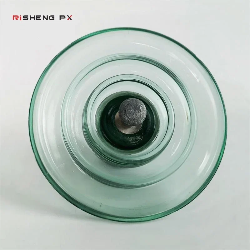U40B glass disc insulator against a plain background